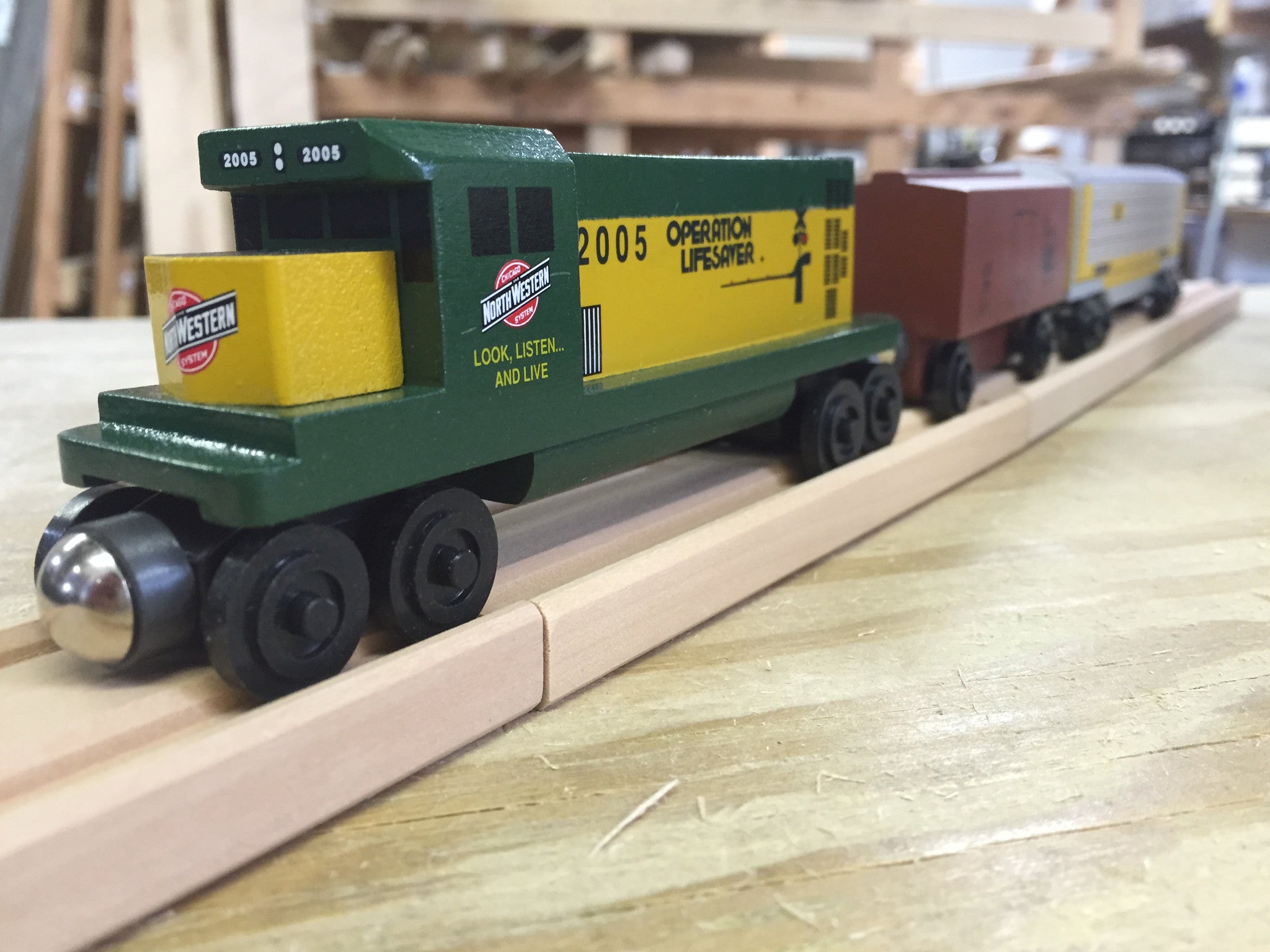 Whittle Shortline Railroad Chicago and Northwestern GP-38 Diesel Engine Wooden Toy Train with other Whittle Trains