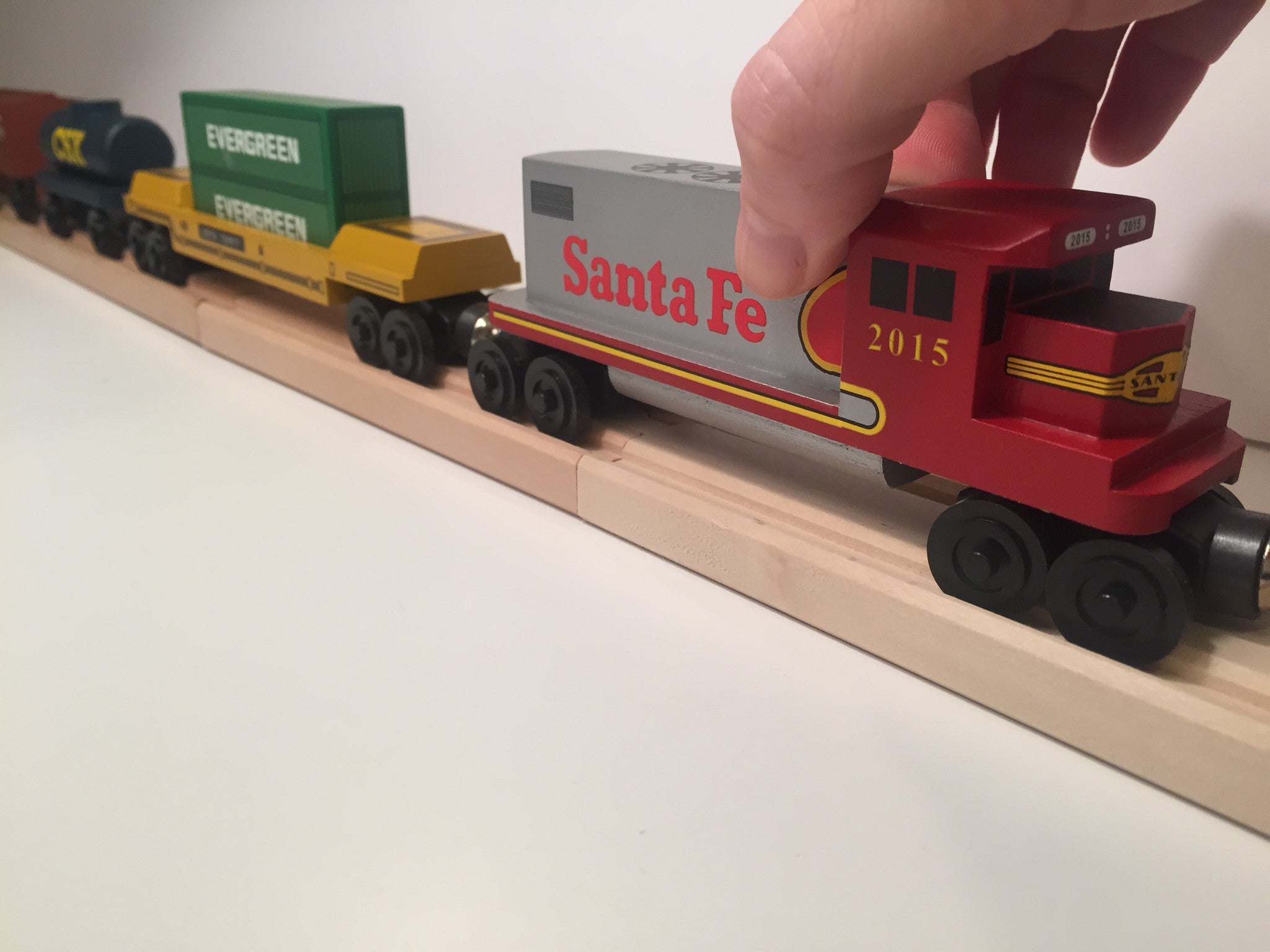 Whittle Shortline Railroad Santa Fe Warbonnet GP-38 Engine with other Whittle trains